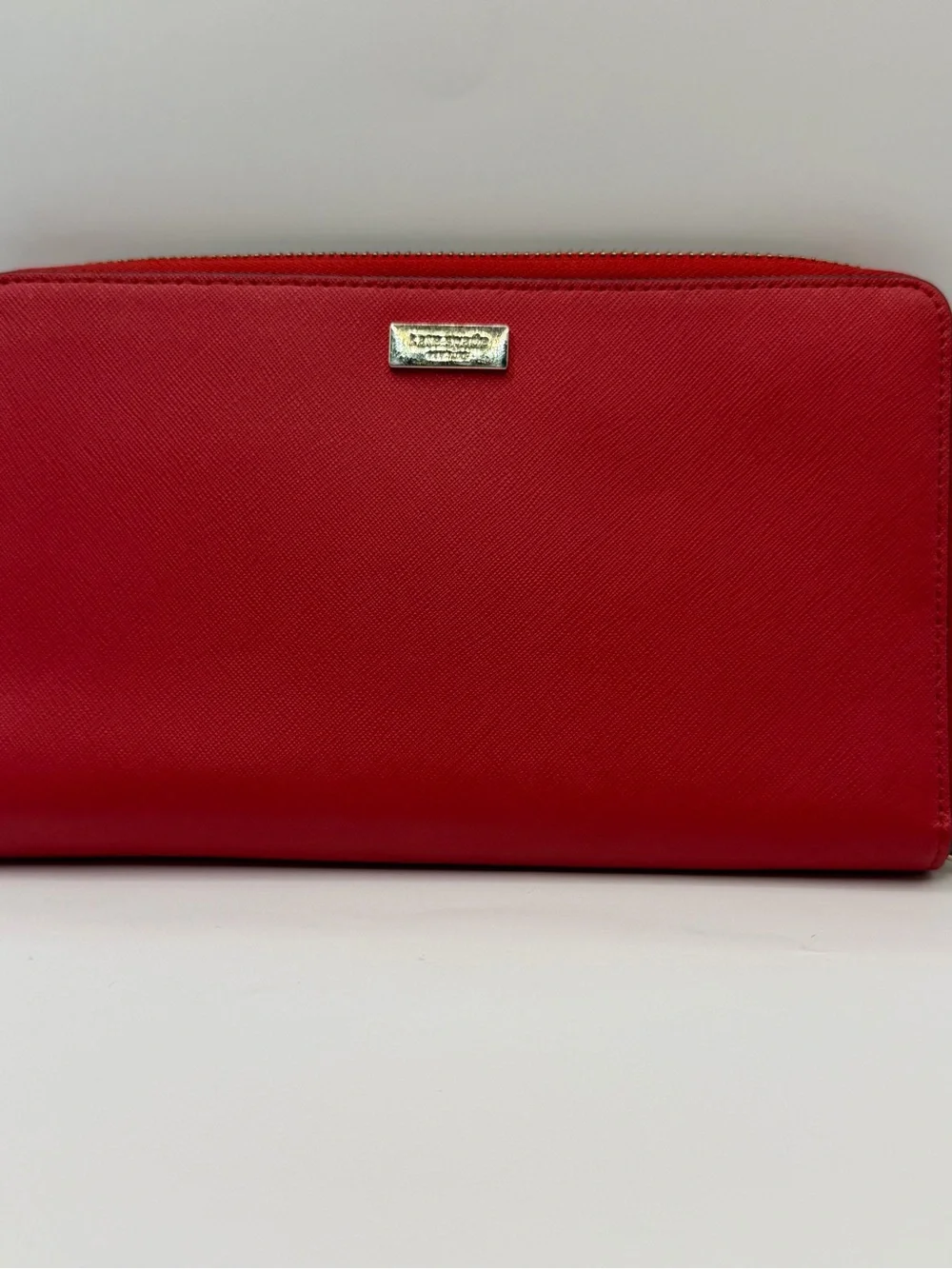 Kate Spade New York red Saffiano leather extra large zipper round wallet
